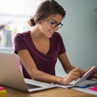 Professional Woman Using Tablet